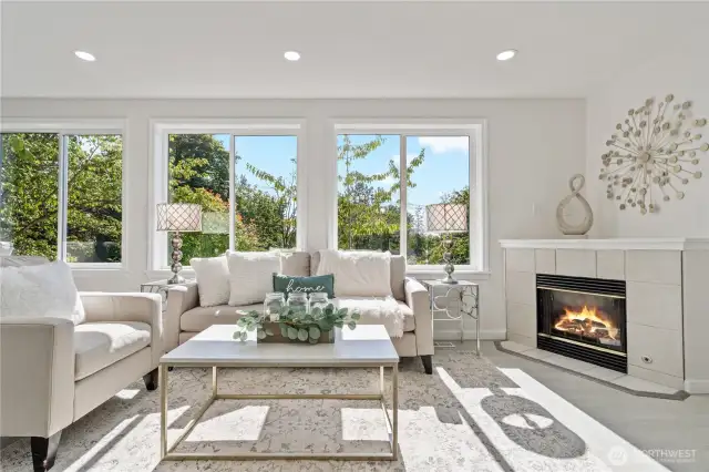 Bright living room with large window and territorial view.