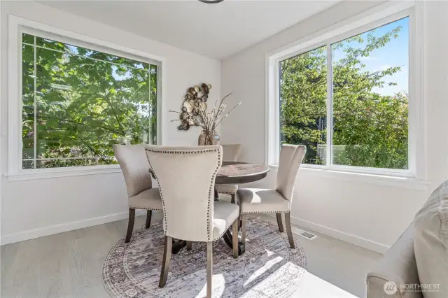 Spacious dining area seamlessly connected to the kitchen and living room