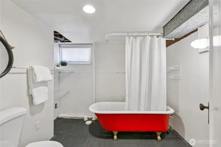 Basement bathroom with clawfoot tub.