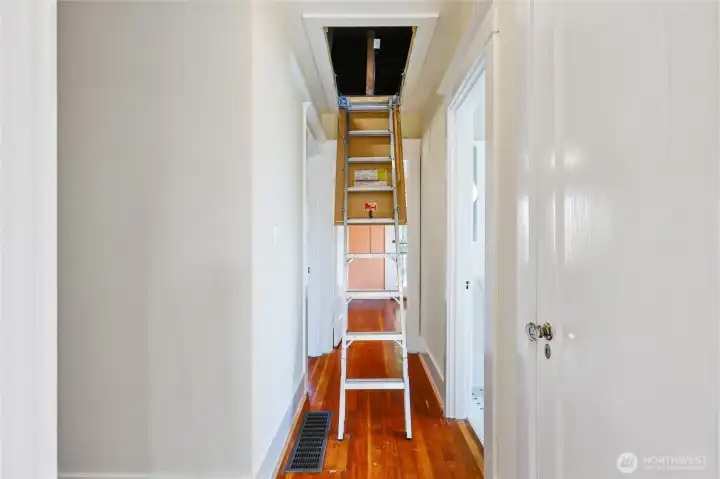 Pull down ladder for easy access to attic.