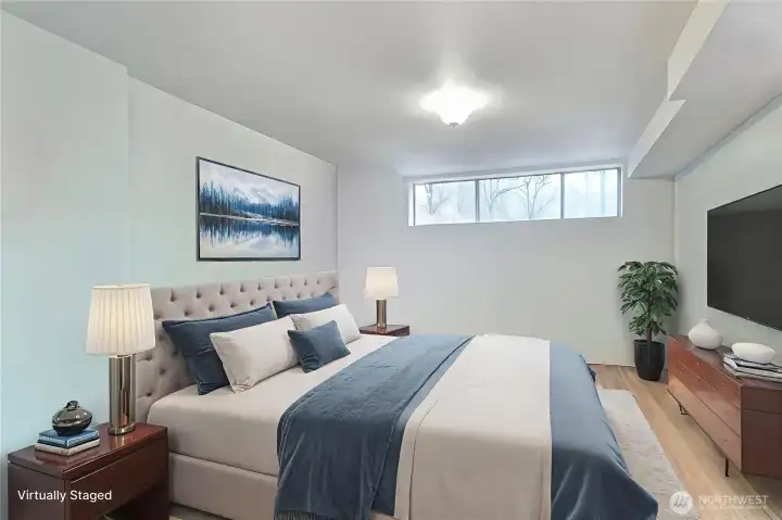 Downstairs 3rd bedroom, home office, craft room, the ideas are endless. Virtually staged, photo does not reflect owners personal packed boxes and belongings.