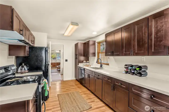 Gleaming new kitchen cabinets & countertops.
