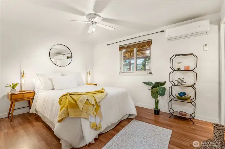 Big primary bedroom easily fits a king size bed