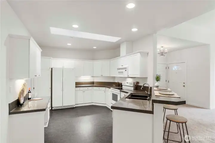 Bar seating and a ton of storage in the kitchen