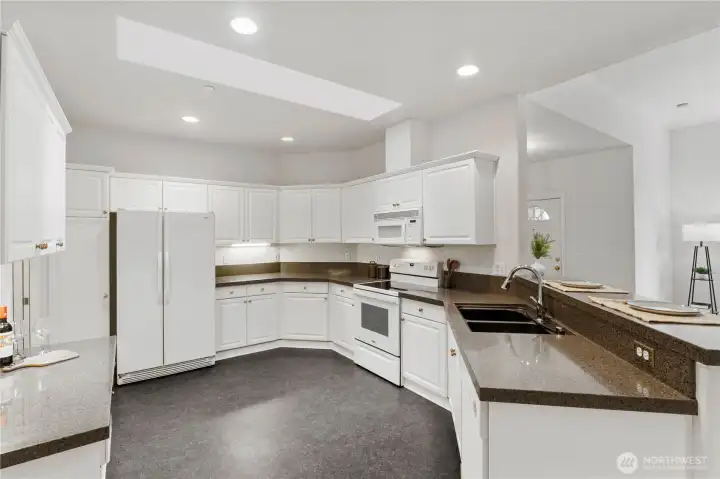 Gorgeous countertops and spacious kitchen layout