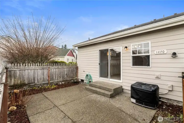 Private yard with A/C unit