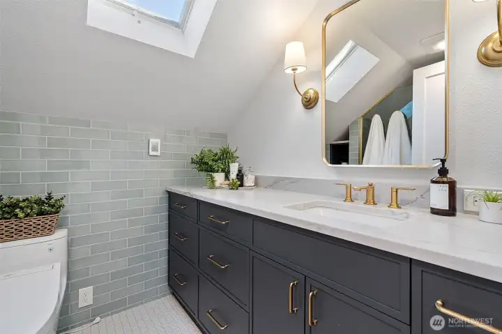 Renovated bathroom provides a layer of luxury.