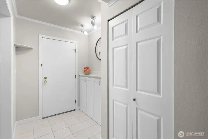 Entry way with a coat closet.