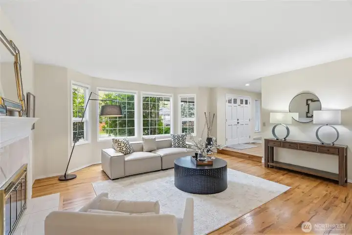 Formal living room with bay windows.