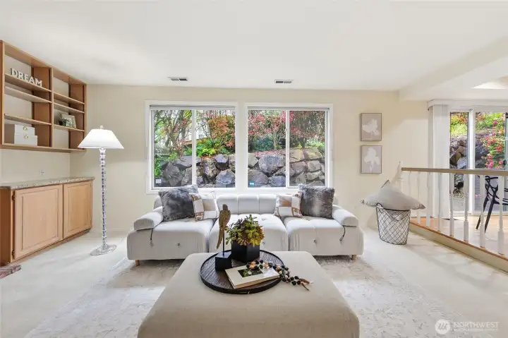 Family room with large windows.