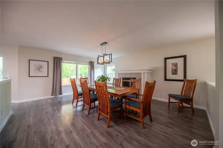 Huge dining room fits a huge table, complete with fireplace. Huge dining room fits a huge table, complete with fireplace.