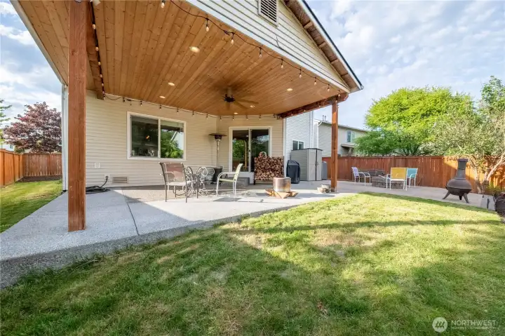 Covered patio with built in lighting and ceiling fan. Covered patio with built in lighting and ceiling fan.
