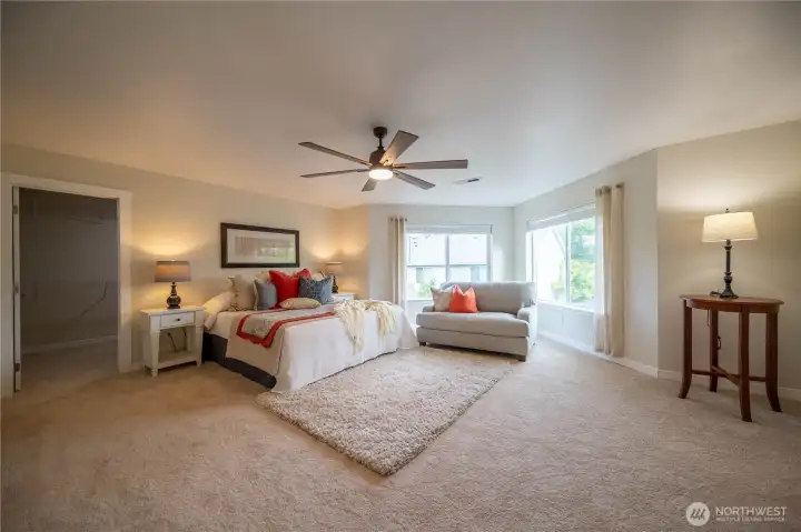 Primary bedroom. Open and spacious. Perfect for that special reading sittee you've always wanted. Primary bedroom. Open and spacious. Perfect for that special reading sittee you've always wanted.