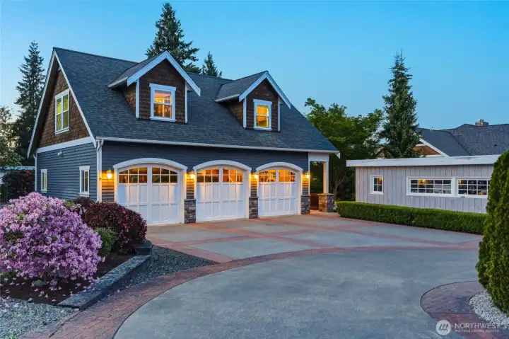 Detached 3-car garage with an apartment above.