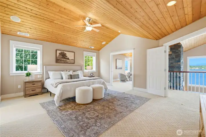 Primary suite features vaulted cedar ceilings, french doors leading to your private sitting room.