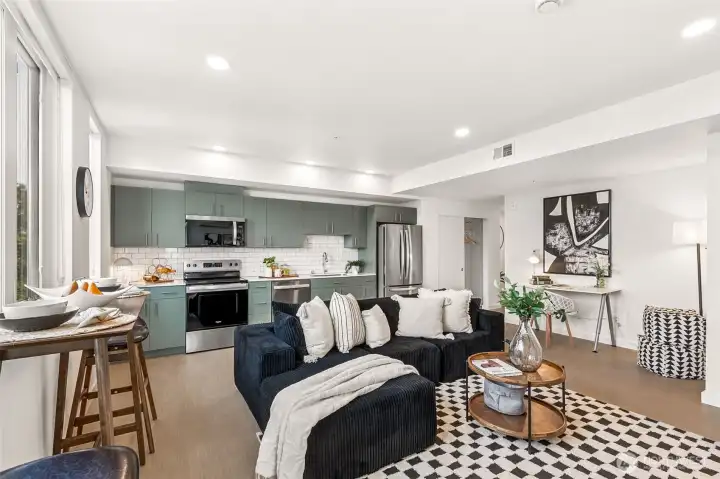 Modern open layout with lvp flooring, quartz countertops and energy efficient stainless steel appliances Modern open layout with lvp flooring, quartz countertops and energy efficient stainless steel appliances