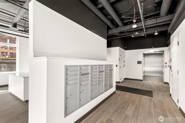 Lobby mailbox area and secured access elevator Lobby mailbox area and secured access elevator