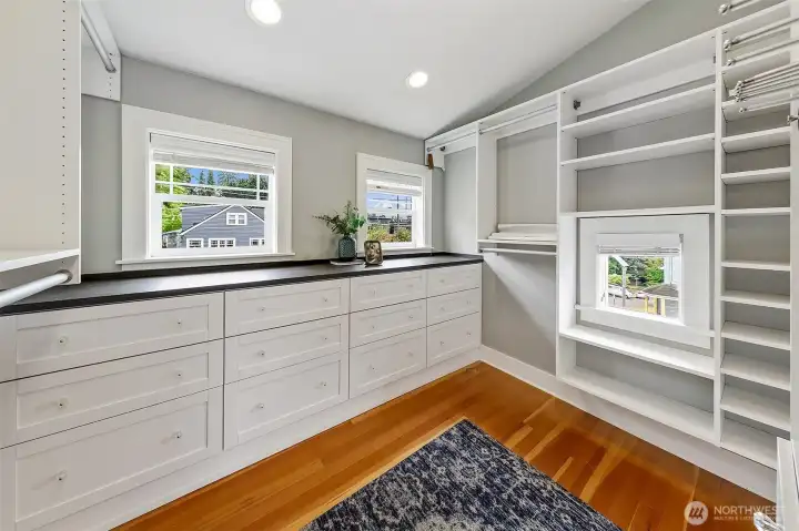 walk in closet of primary bedroom walk in closet of primary bedroom