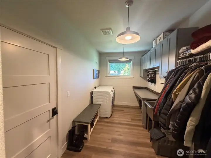 Extra large laundry room with utility sink and washer and drier Extra large laundry room with utility sink and washer and drier