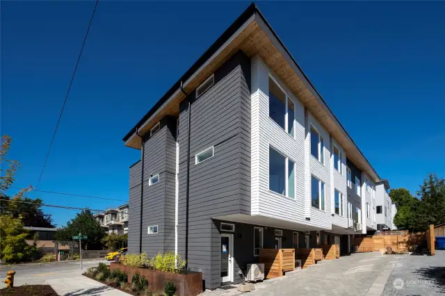 This is a look from the back as this unit has a 1-car Attached garage! And easy bike routes to downtown Seattle and South Lake Union.