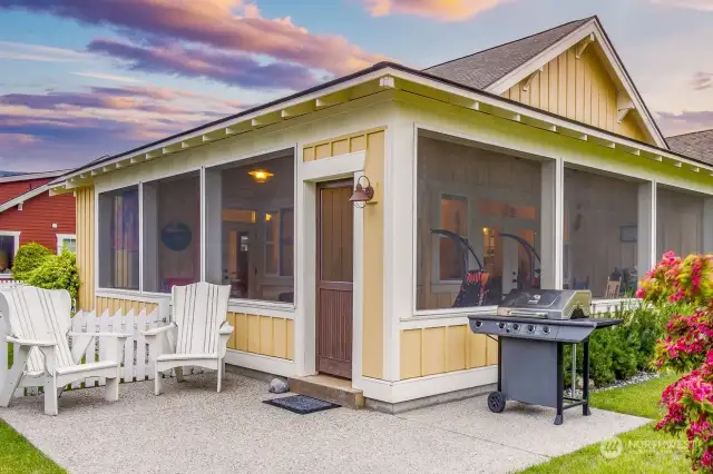 Patio with BBQ ppens to common greenspace