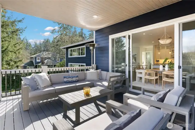 With planked ceilings for a warm atmosphere, the year round porch will be one of your favorite spots in this home. Offering easy access to the kitchen and stairs to the yard, this thoughtful design maximizes interior and exterior spaces.