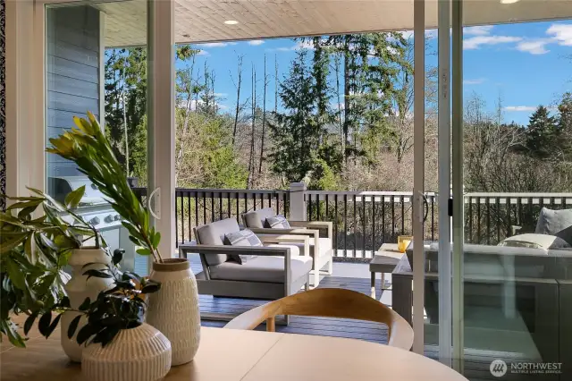 The dining room offers indoor outdoor living, with oversided sliding doors that lead to your covered deck. You'll love every part of this home all year round.