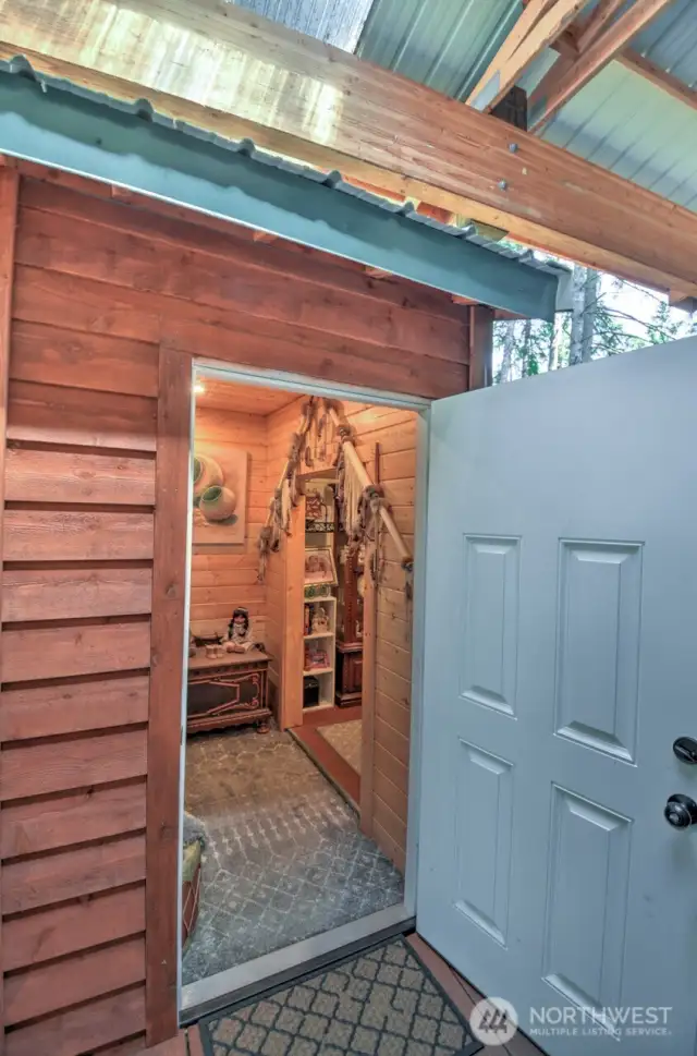 front shed has great cabinets, washer/dryer and seating area