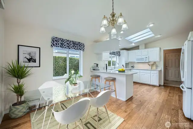The eat-in kitchen area connects via slider to the backyard patio offering plenty of room to entertain.   *virtually staged