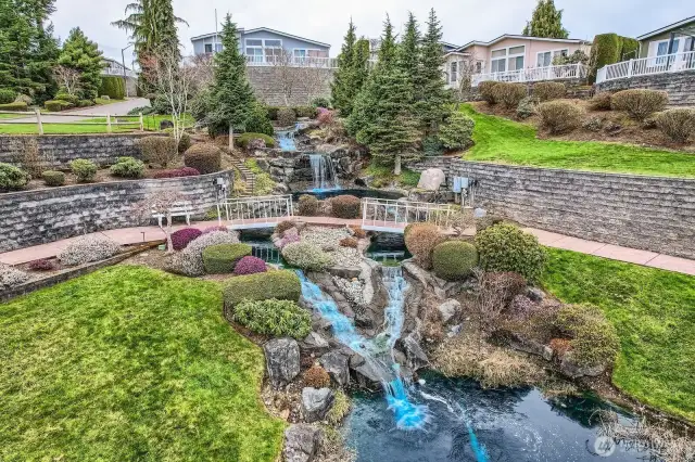 Beautiful pathways and landscaping to admire within the community and also from backyard