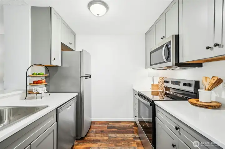 Plenty of counter space and storage in the kitchen.