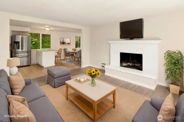 Living room into dining room and kitchen with virtual staging