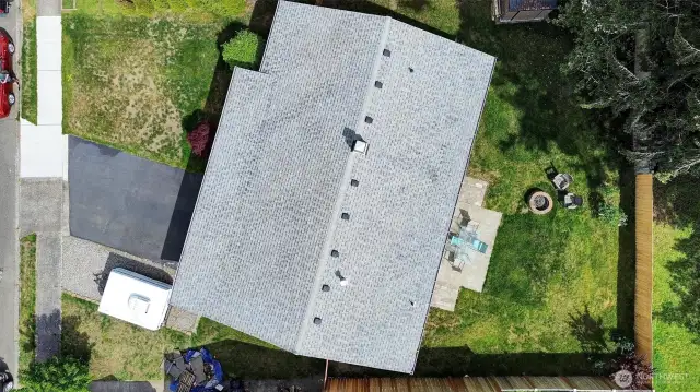 Drone photography of lot and the roof of  the home