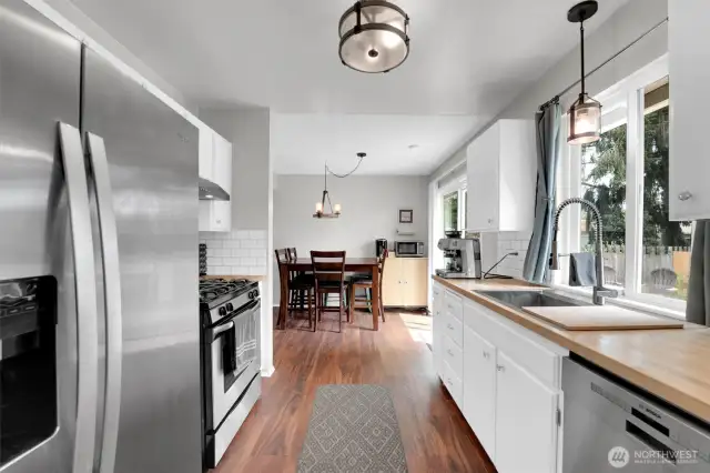 Stainless appliances and bright kitchen