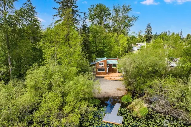 Secluded lot with private dock.