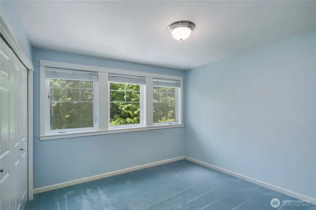 This room faces lake and large windows allow winter views of lake.