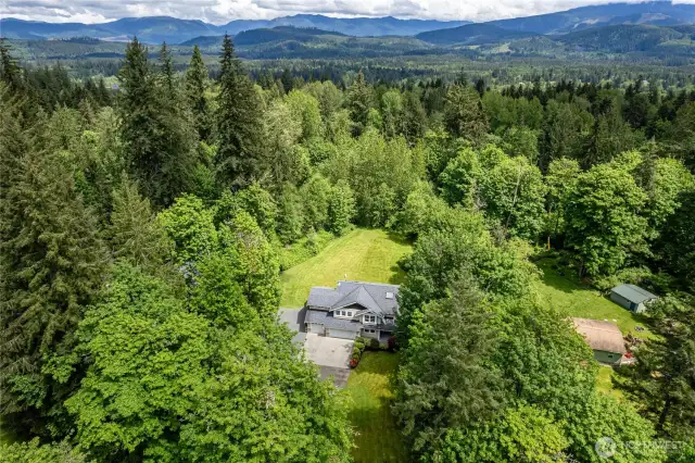 Nestled in the trees with the cascades in the background.  Very private setting.