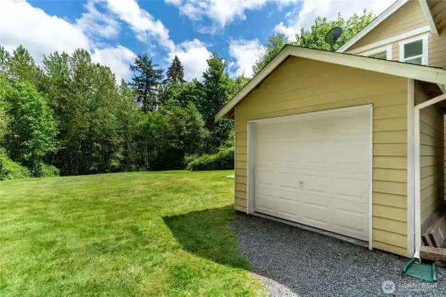 10 x 12 shed with easy access garage door.  Nearby hot/cold water taps for car and dog washing.