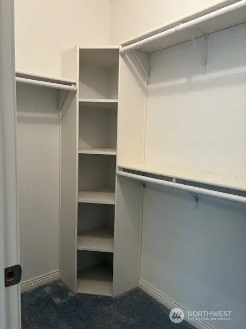 Primary Closet- shelves on both ends!