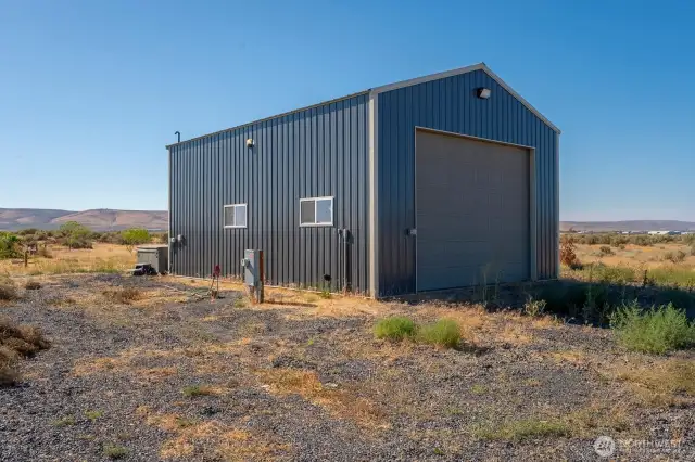Big shop with insulation, heater, half bath, Two RV hookups and EV charging station