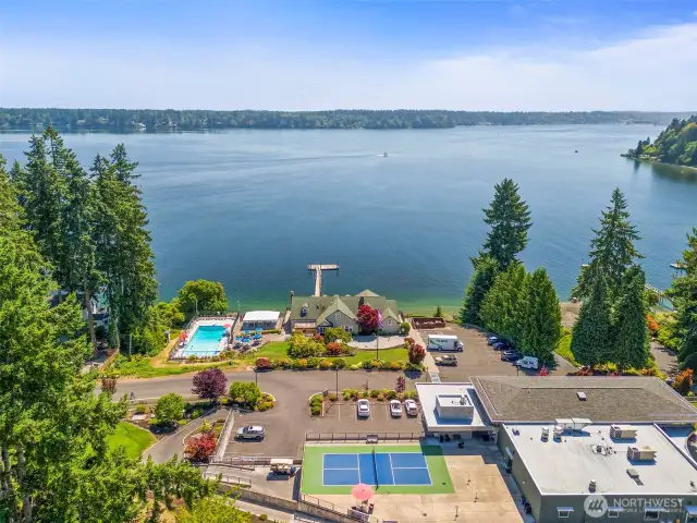 Steps away from the club featuring fine dining, pool, pickleball, dock and beach access!