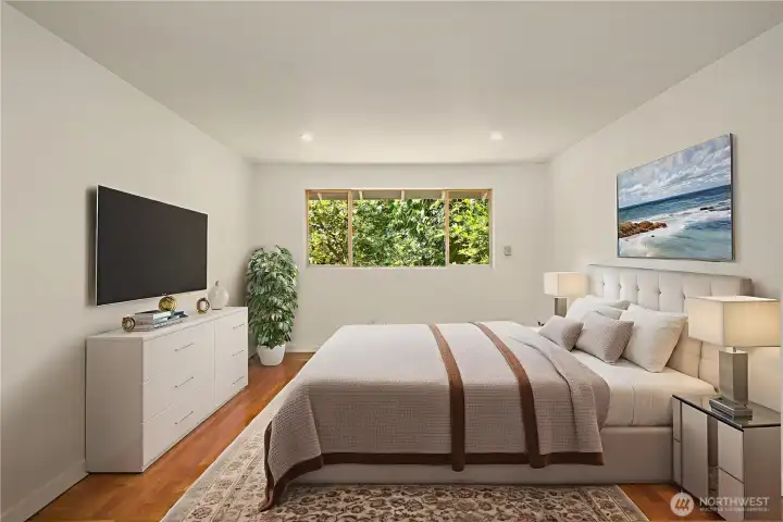 Primary bedroom is twice the size as it appears in photo. It has room for sitting area.