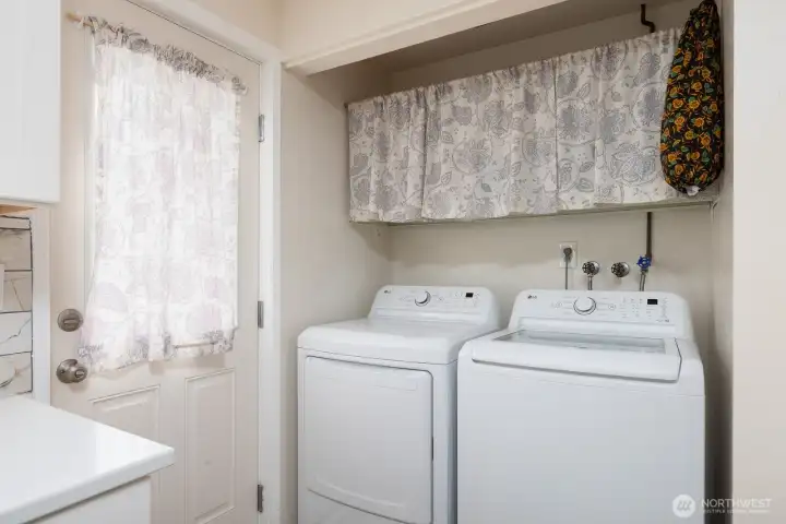 Conveniently located laundry area.