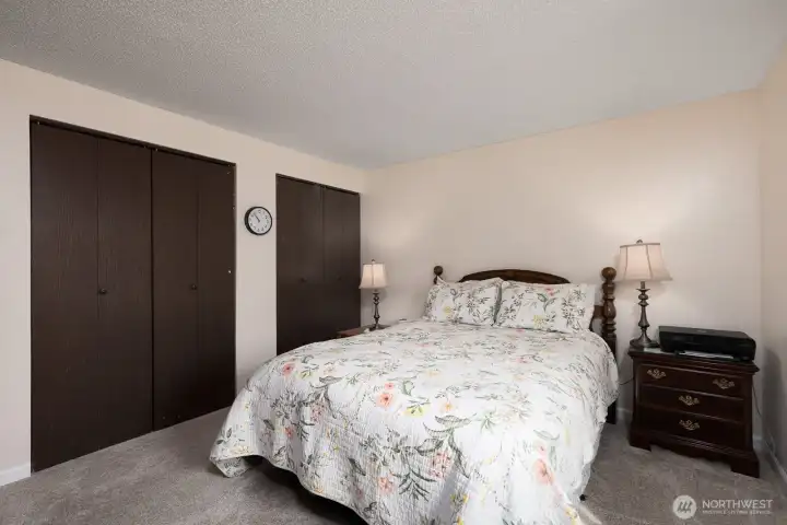Primary bedroom features two closets.