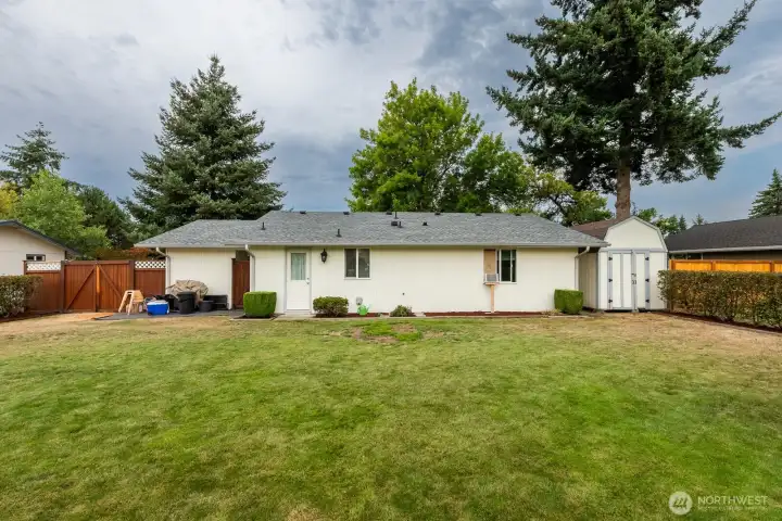 Large fenced backyard—room to play, garden, or relax