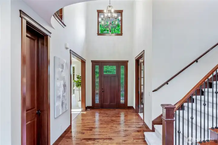 Features genuine hardwood flooring, plush new carpet, trim millwork, and crown molding throughout.