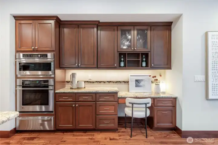 Built-in oven, and microwave, with warming tray, and convenient built-in work station.