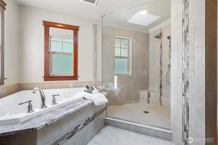 Luxurious bath and shower in your private primary ensuite