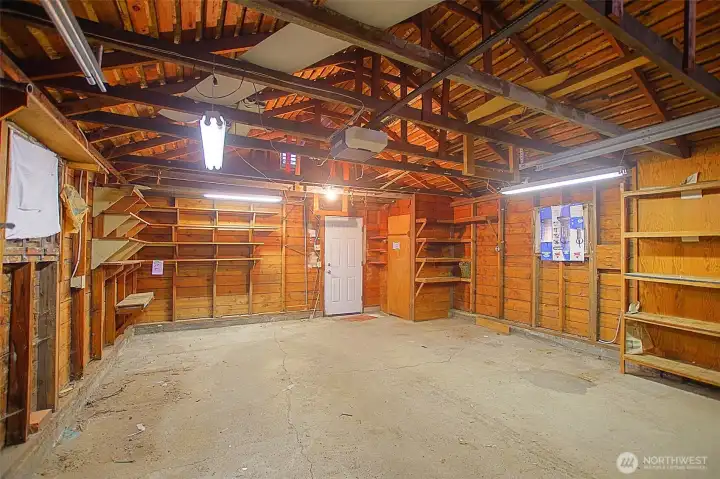 Garage w man door to backyard
