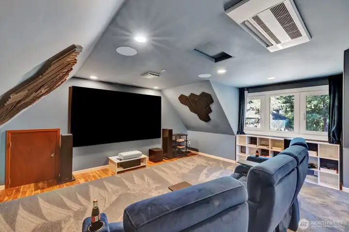 Theatre room has Dolby Atmos stereo & laser projector and is  located above the second garage